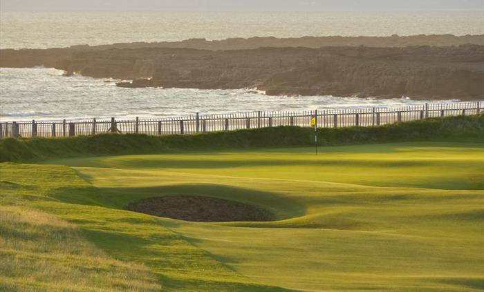 Hole 2 green and backdrop